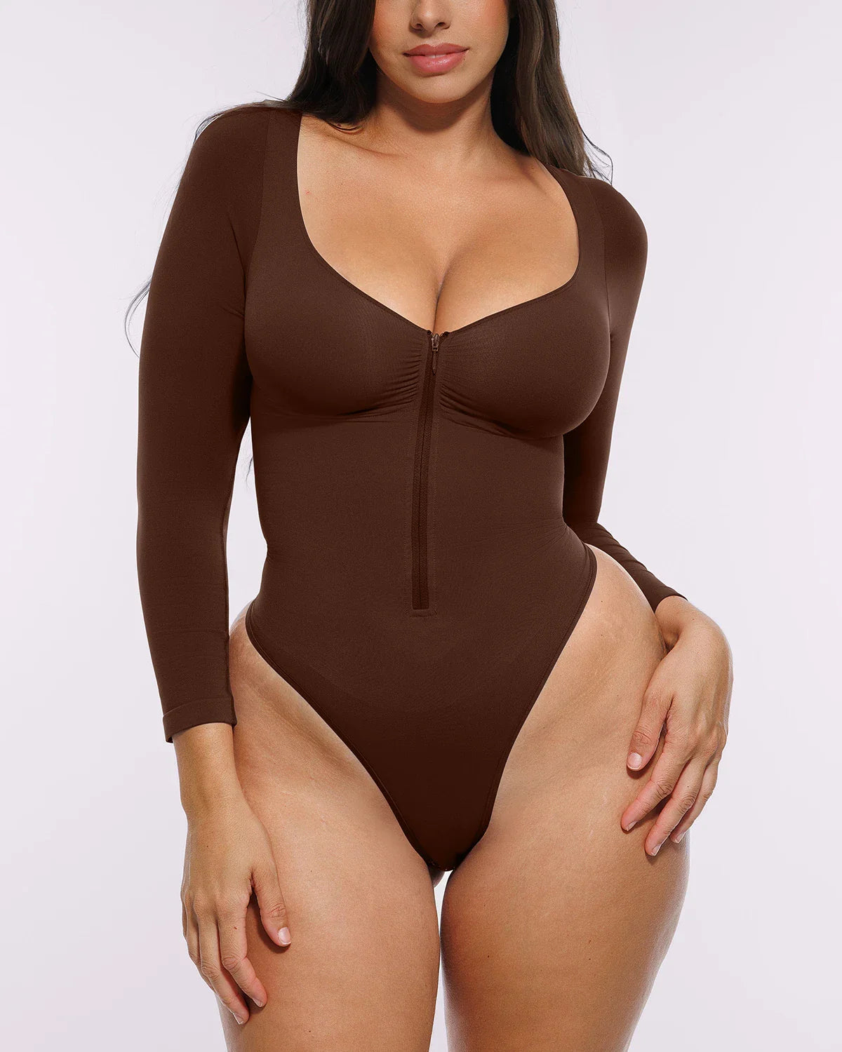 Bare Essentials™ Skin Flow Long Sleeve Zipper Front Thong Bodysuit