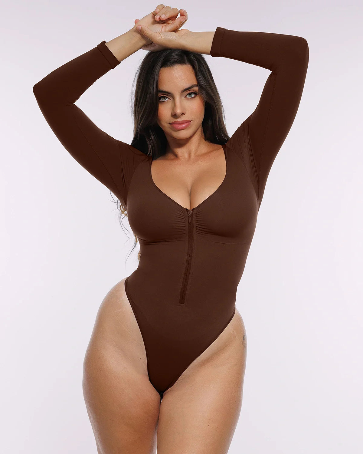 Bare Essentials™ Skin Flow Long Sleeve Zipper Front Thong Bodysuit